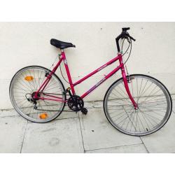 Purple ladies hybrid bike khgfxggvg
