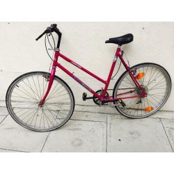 Purple ladies hybrid bike khgfxggvg