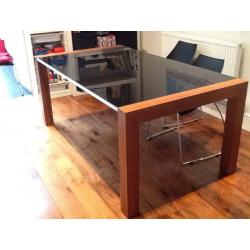 Glass topped dining table and chairs