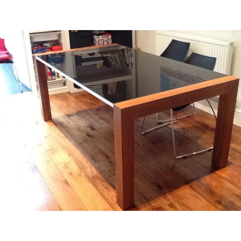Glass topped dining table and chairs