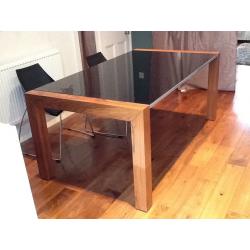 Glass topped dining table and chairs