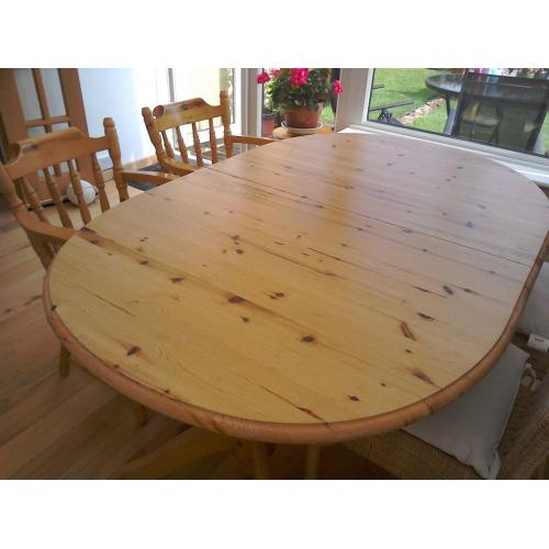 Ikea extendable pine dining table and 4 pine carver chairs