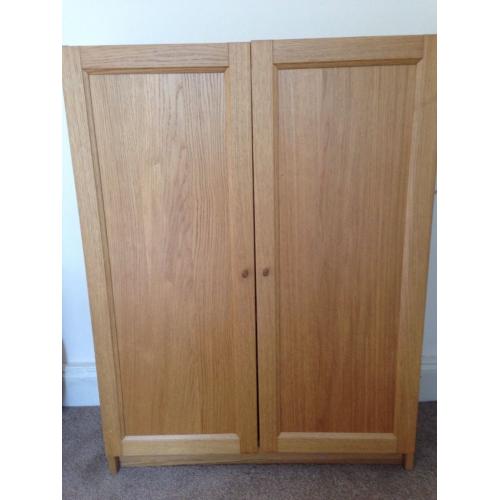 Shelving unit with cupboard doors