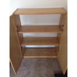 Shelving unit with cupboard doors