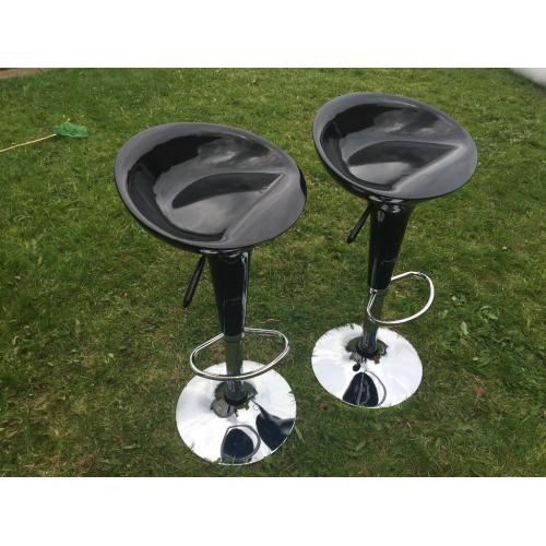 Two black gloss gas powered breakfast bar stools