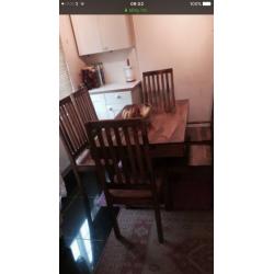 table and six chairs Is very good condition