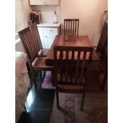 table and six chairs Is very good condition