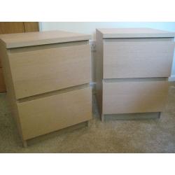 Two light wood bedside 2 drawer cabinets