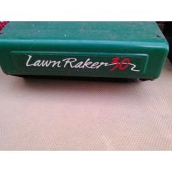 Lawn scarifier.
