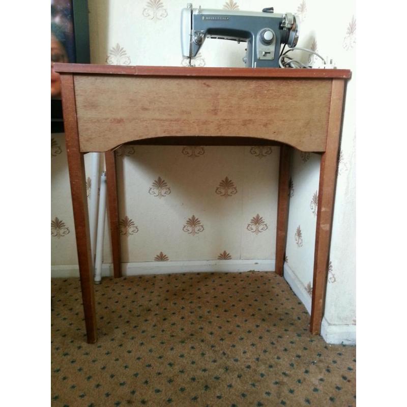vintage sewing machine with table