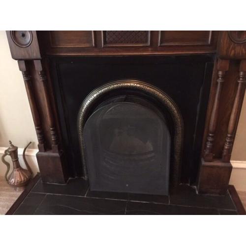 Cast iron fireplace and mantelpiece for sale
