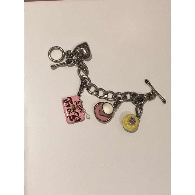 Juicy Couture silver charm bracelet with 3 charms