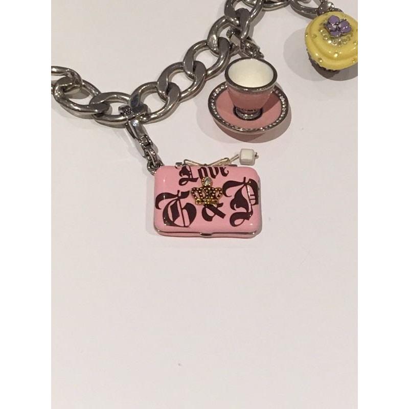 Juicy Couture silver charm bracelet with 3 charms