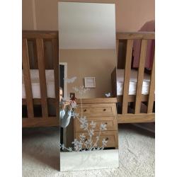 Mirror with butterfly detail