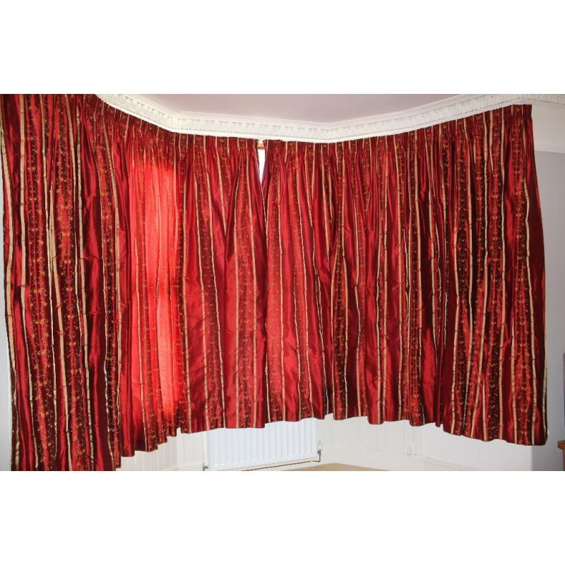 Beautiful red and gold curtains for a big window
