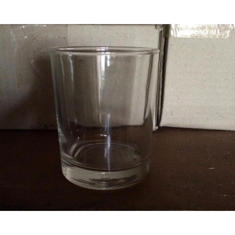 Candle making supplies, e.g.. glasses, wicks, wick plates