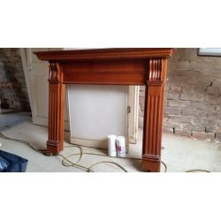 Wooden fire surround.