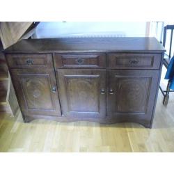 Dark wood sideboard, 3drawer, 3cupboards. Good condition. Buyer collects
