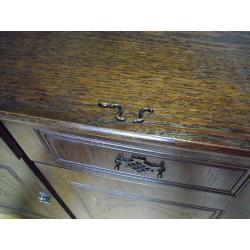 Dark wood sideboard, 3drawer, 3cupboards. Good condition. Buyer collects