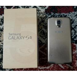 Samsung Galaxy S5 Gold, Unlocked, Good condition with Original box, charger and cases