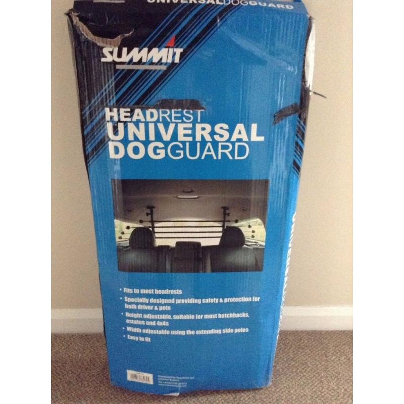 Universal dog guard -never used as dog liked being in a crate.