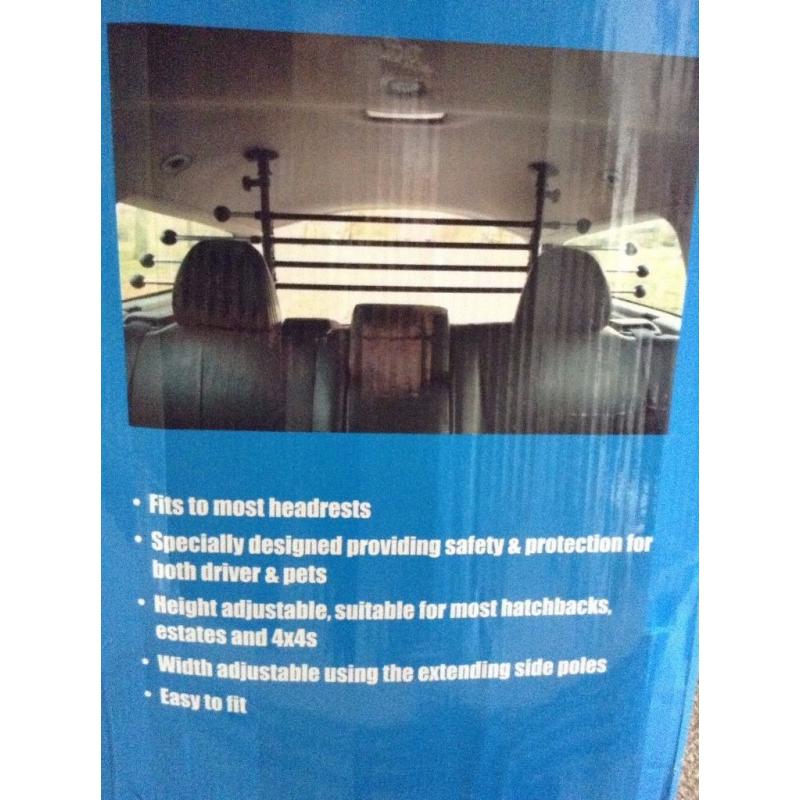 Universal dog guard -never used as dog liked being in a crate.