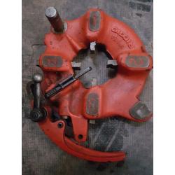 Rigid die head