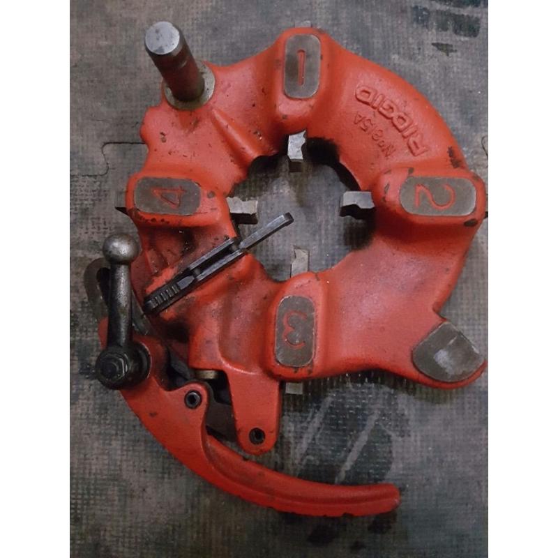 Rigid die head
