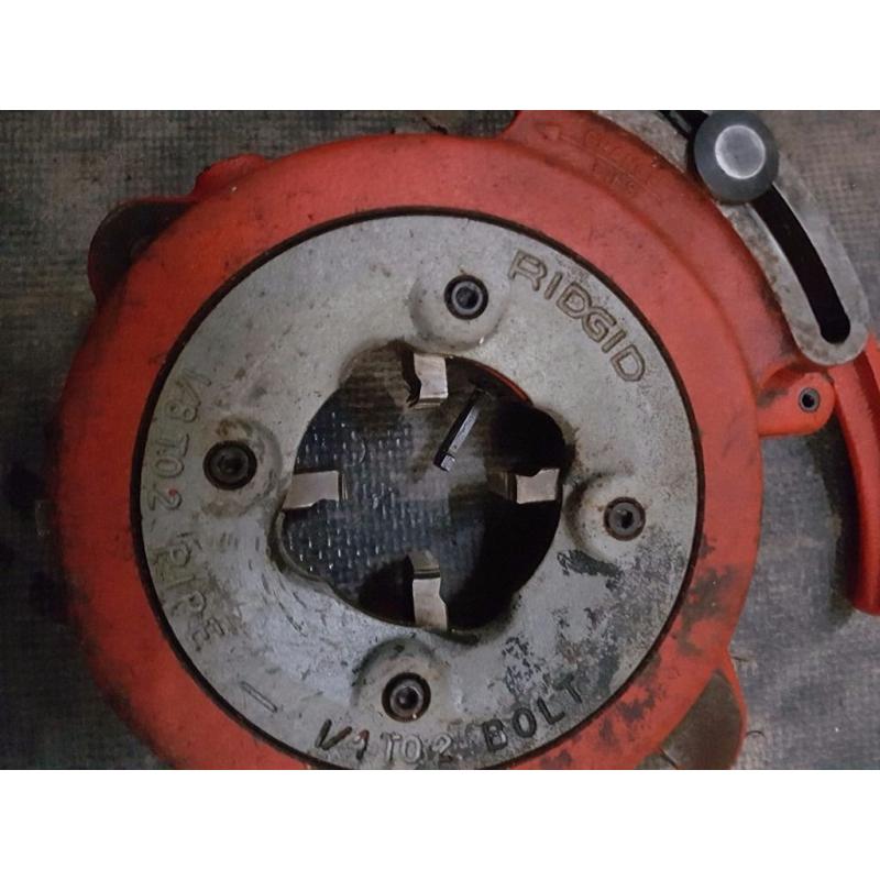 Rigid die head