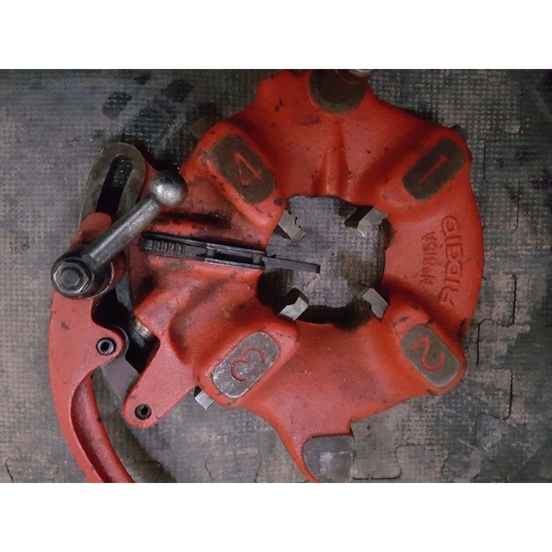 Rigid die head