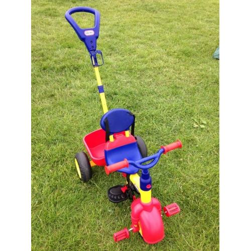 Little tykes trike with parent control handle .