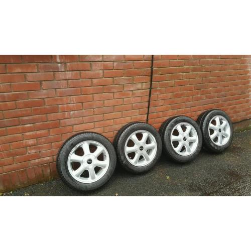 4x100 BMW MINI GENUINE 15 INCH ALLOYS NEAR NEW AVON TYRES