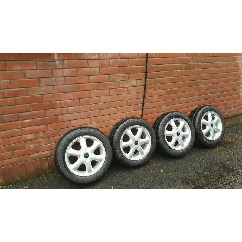 4x100 BMW MINI GENUINE 15 INCH ALLOYS NEAR NEW AVON TYRES