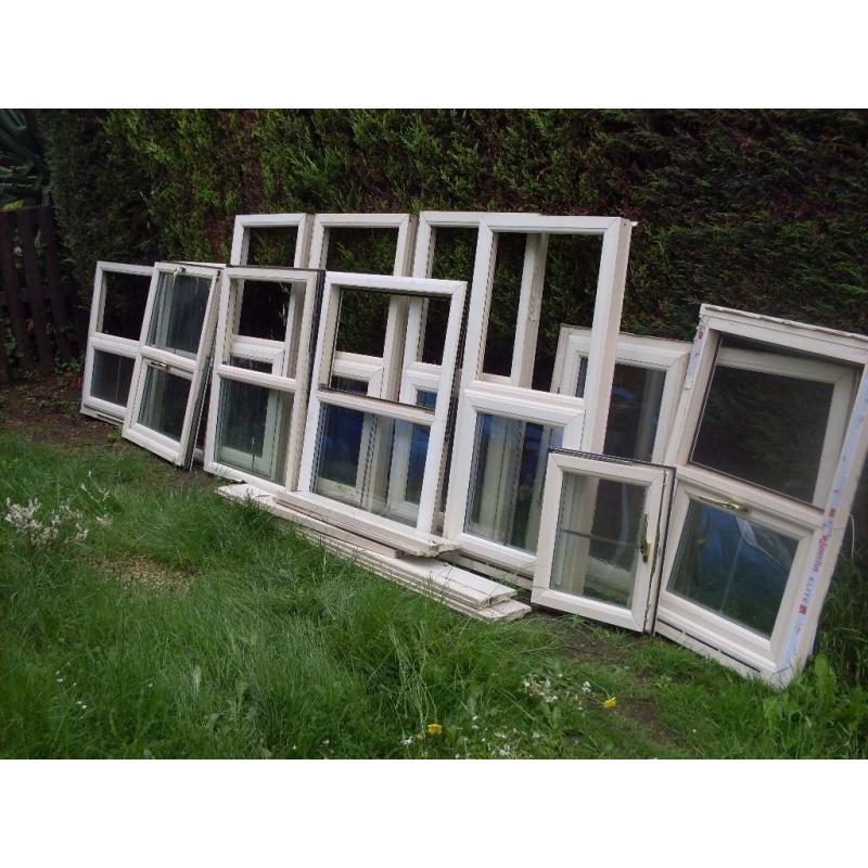 several single windows 1 door and 1 large frosted window