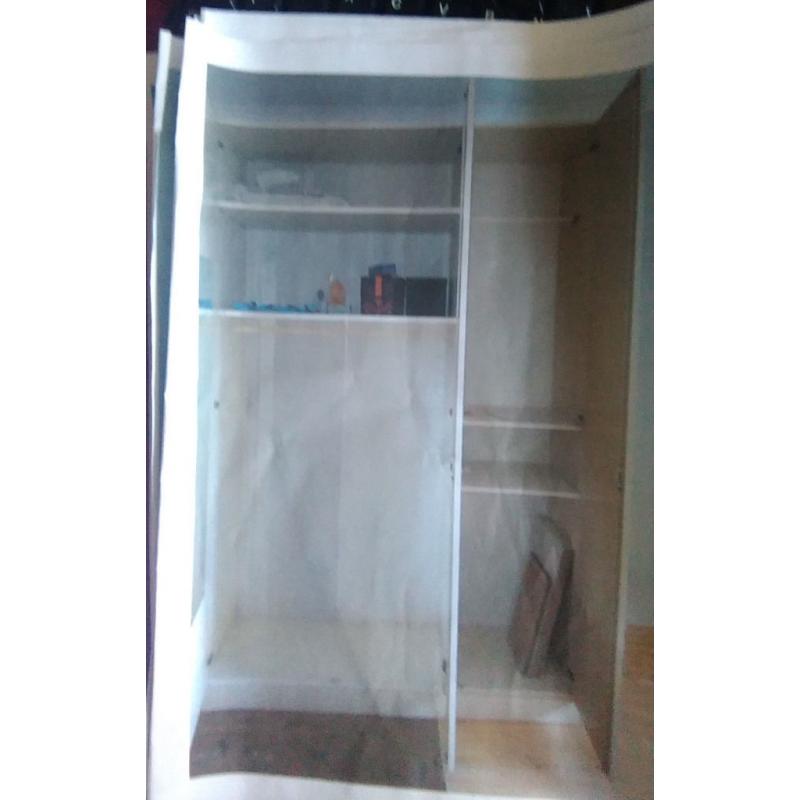 HOUSE CLEARANCE! -huge cream gloss tripple door wardrobe, four generous size shelves and rail