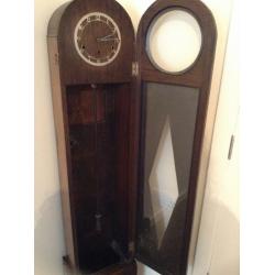 Antique grandaughter clock in need of restoration