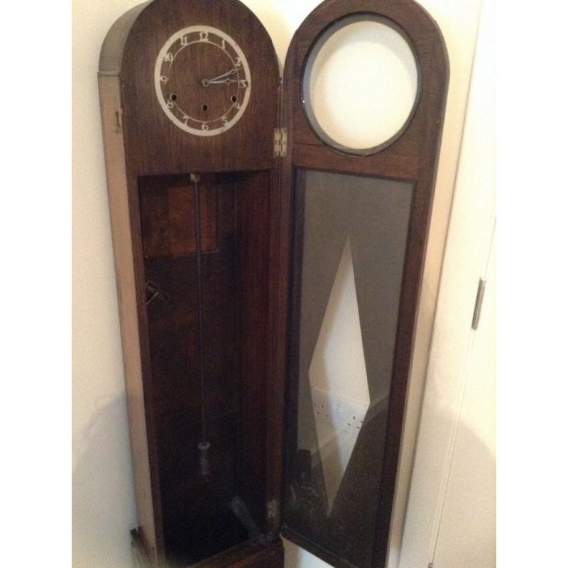 Antique grandaughter clock in need of restoration