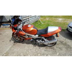 honda VTR 1000 in candy orange part x 1200 harly with EFI engine or why
