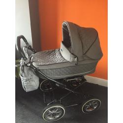 Babystyle prestige pram with wetwall chassis parts still boxed