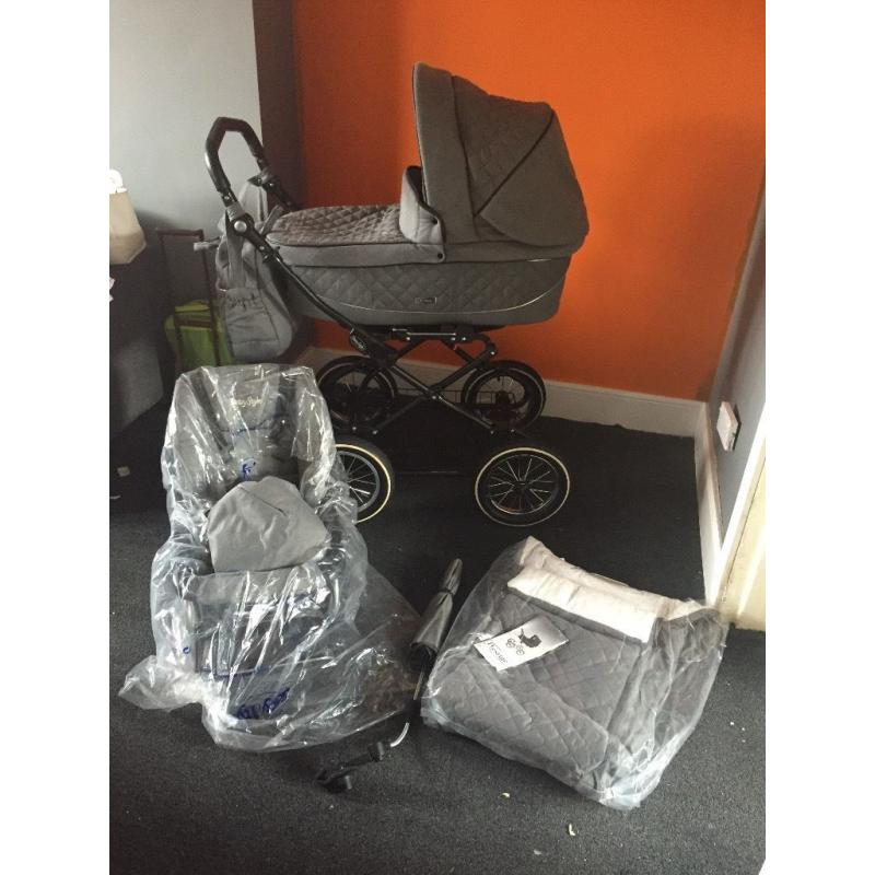 Babystyle prestige pram with wetwall chassis parts still boxed