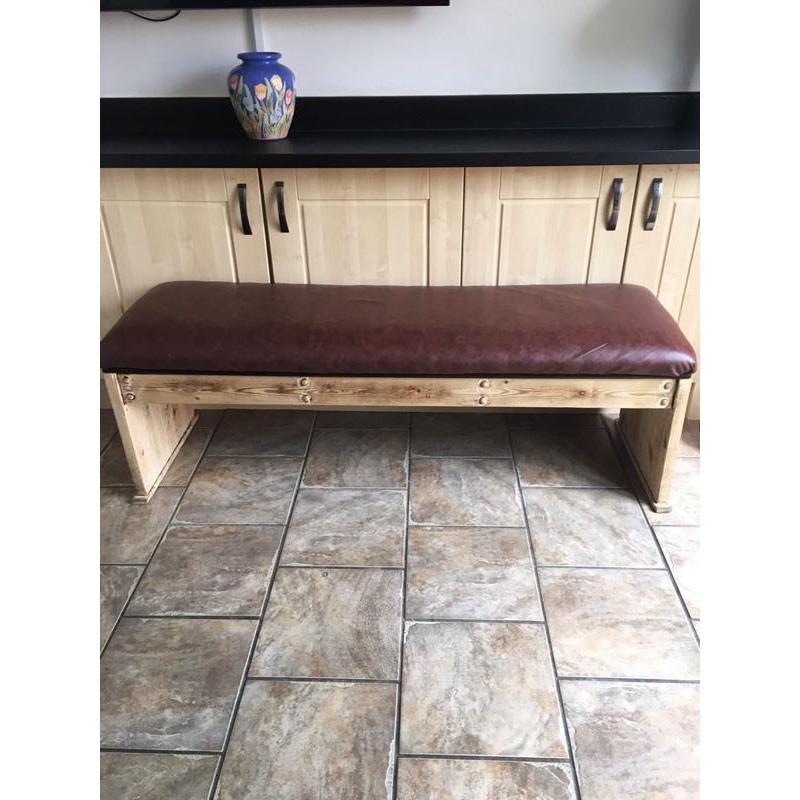 Solid pine bench with thick cushioned seating