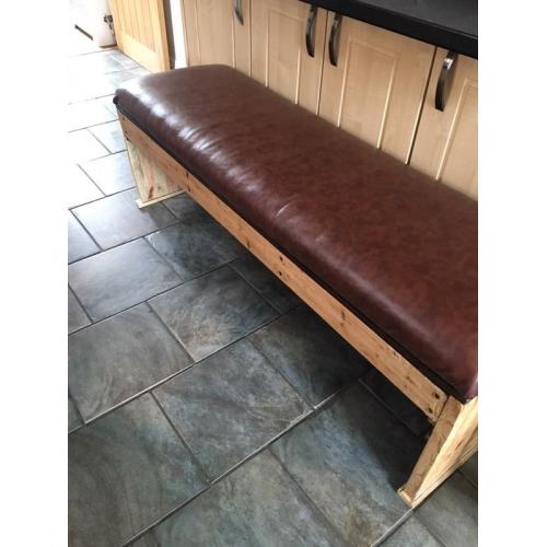 Solid pine bench with thick cushioned seating
