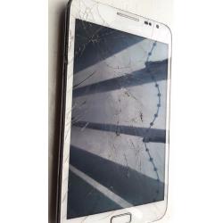 Samsumg Galaxy Note - Cracked screen but dosnt affect use. Fully working and great phone.