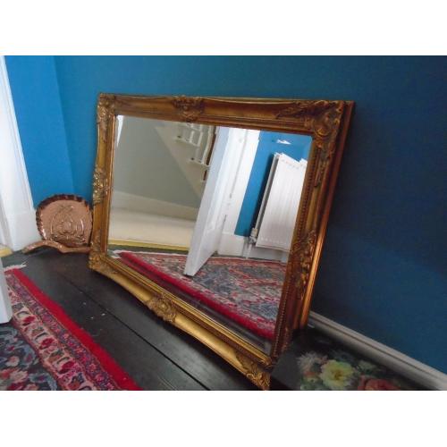 Ornate gilt mirror