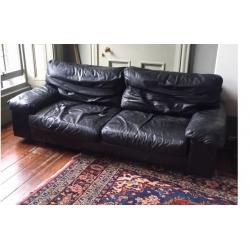 Large Black Leather Heals Sofa with broken cushion zips