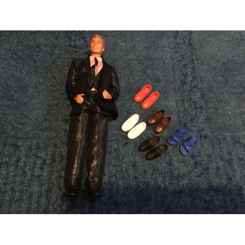 Barbie - Ken doll and extra shoes