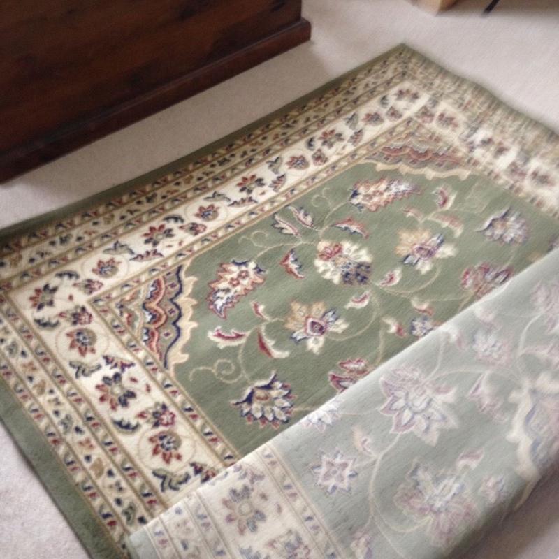 Traditional green rug