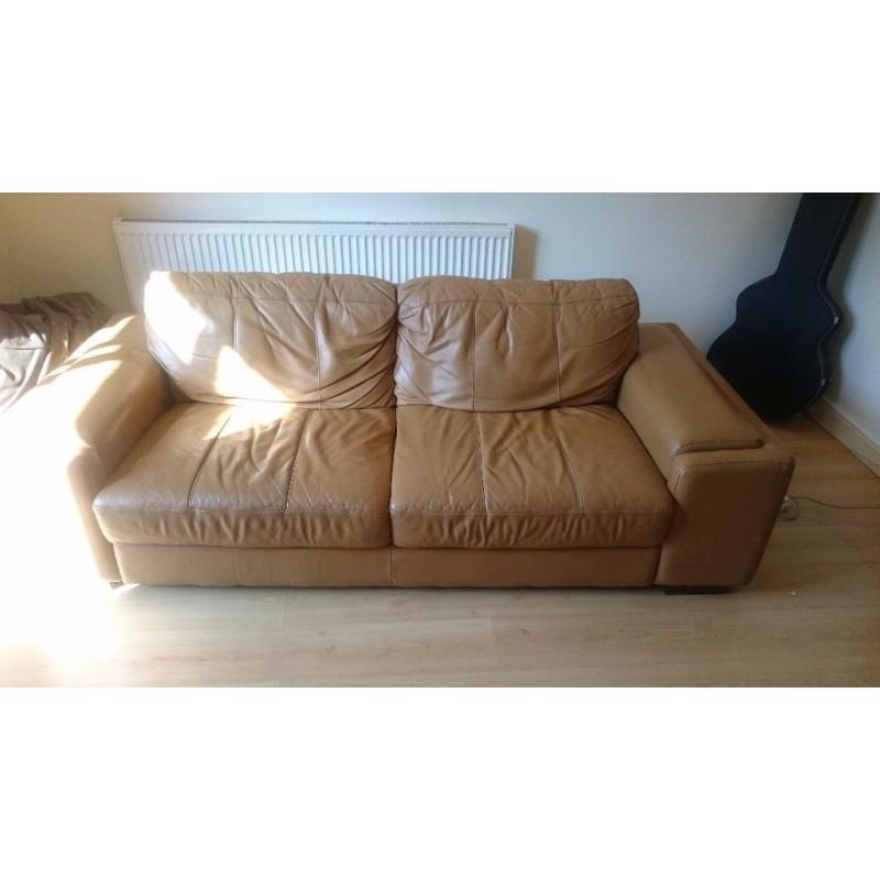 Caramel colour 2 Seater leather Sofa (Used condition)