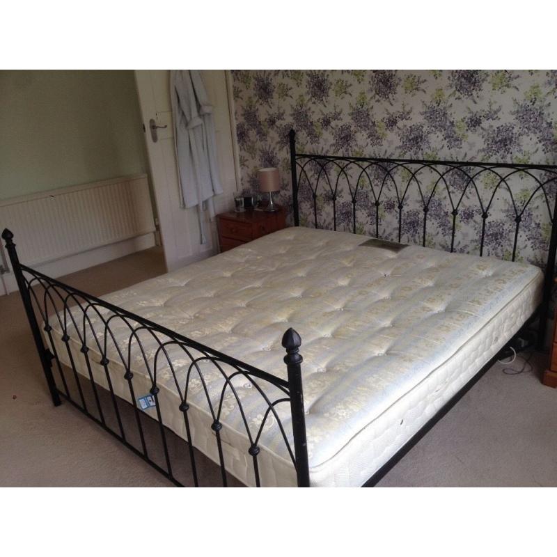 Wrought iron Super king bed frame with/without mattress. Structurally sound- few signs of wear.