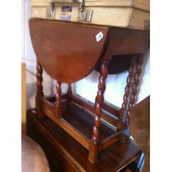Drop Leaf table with barley twist legs , nice oval shape when up.